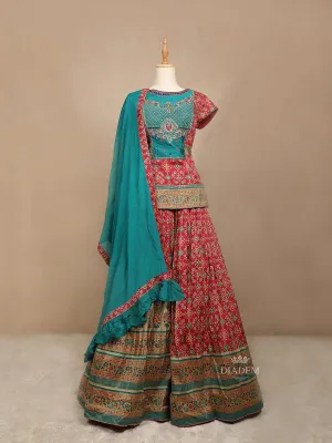 Crimson Red Silk Lehenga Adorned with Floral Embroidery and Prints, Paired with Contrast Dupatta